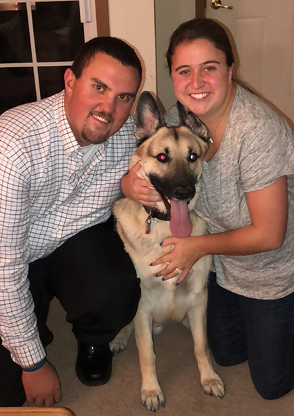 Photo of Casey Woodman, His Wife and His Dog